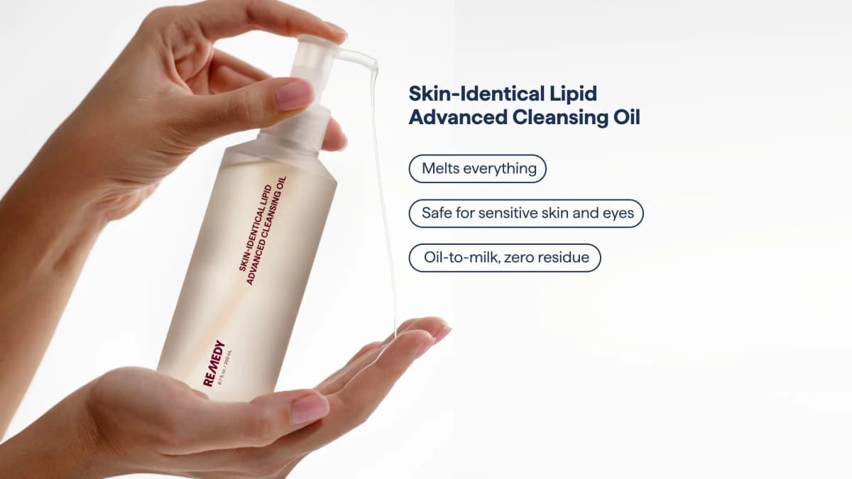 Hands pumping a thin stream of oil into a palm, with callouts: melts everything, safe for eyes, oil-to-milk zero residue