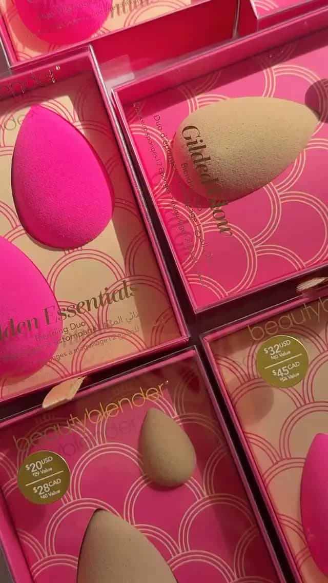 Stacked pink beautyblender holiday boxes with Golden Essentials and Gilded Glow sponges and gold price stickers