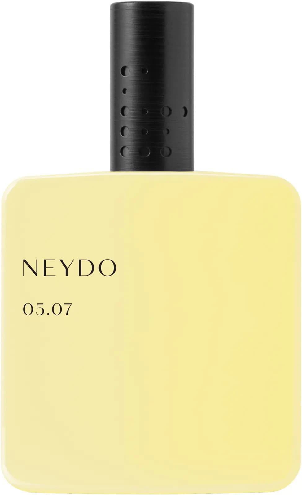 Pale yellow NEYDO 05.07 bottle with brushed black perforated cap on a white background