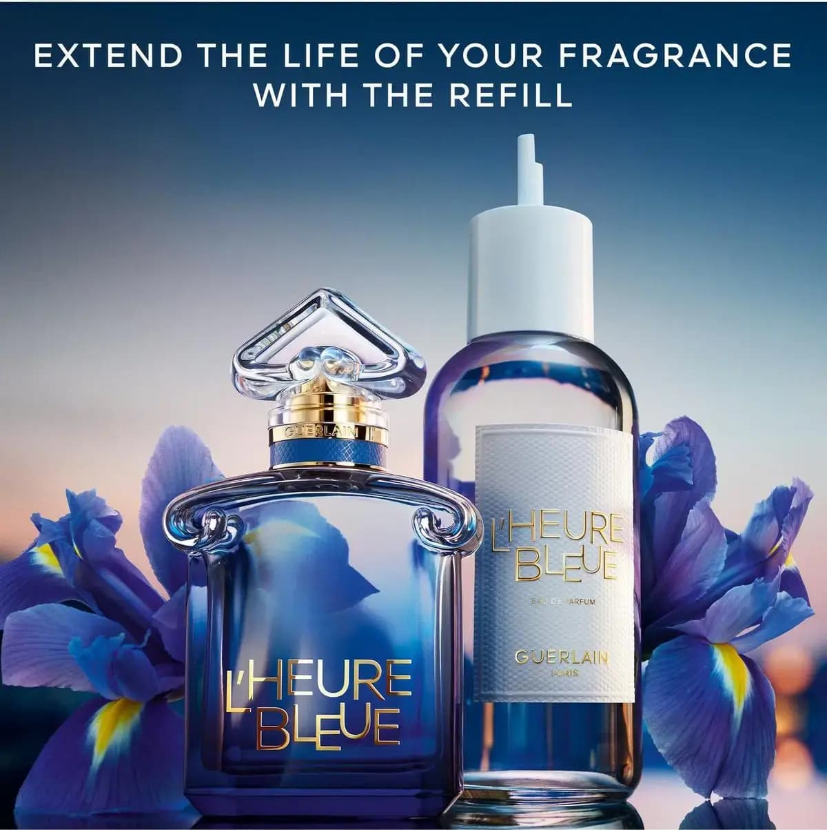 L'Heure Bleue bottle beside a white-labelled Guerlain eau de parfum refill bottle with irises, promoting the refill.