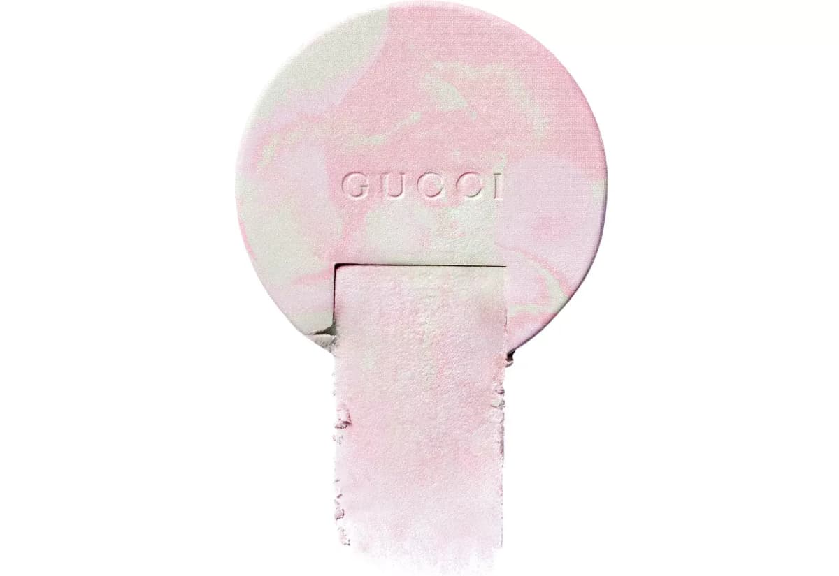 Pink and mint marbled powder pan with a wide pale pink shimmery swatch extending below it
