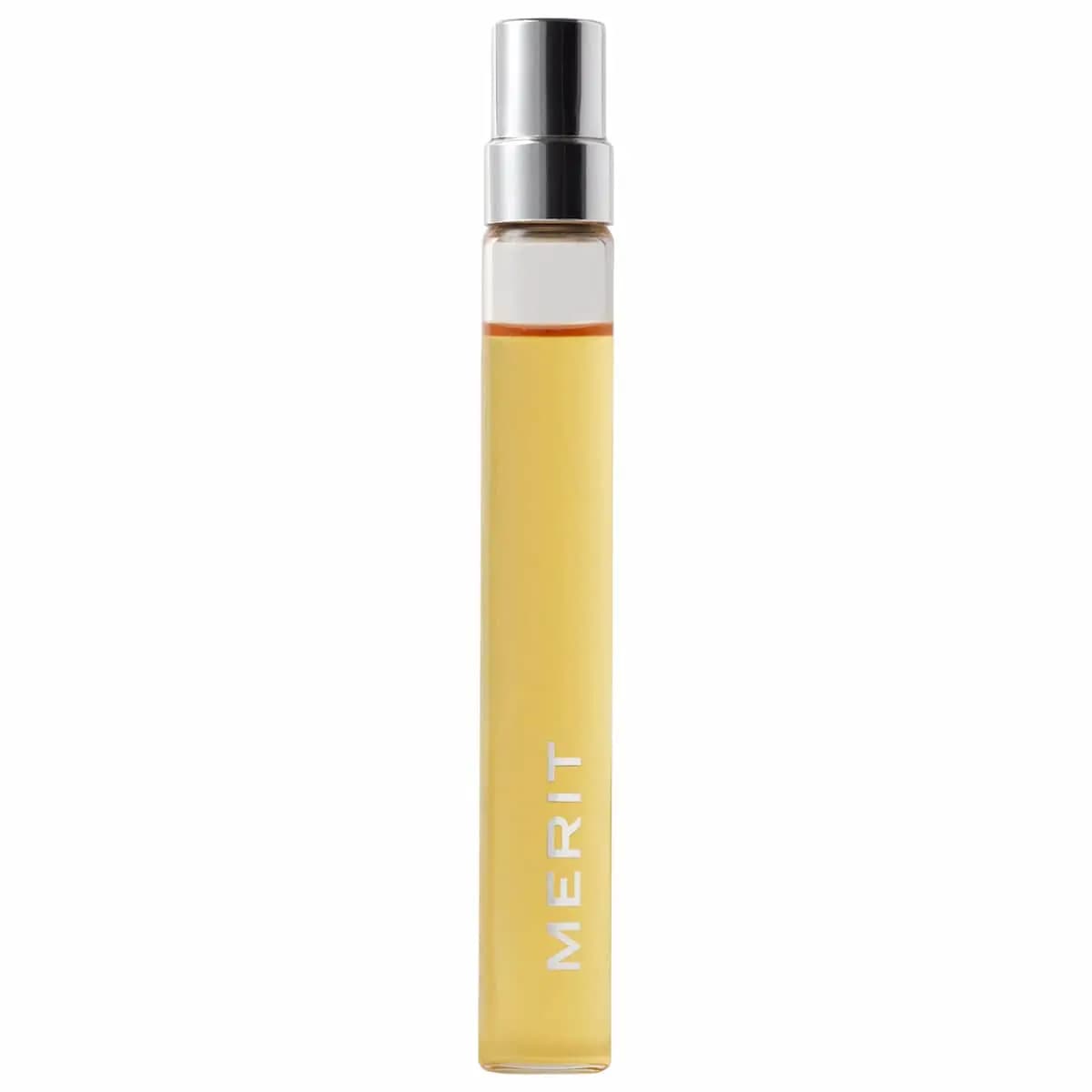 Slim 9 ml travel spray with golden liquid, silver cap and vertical white MERIT lettering on white