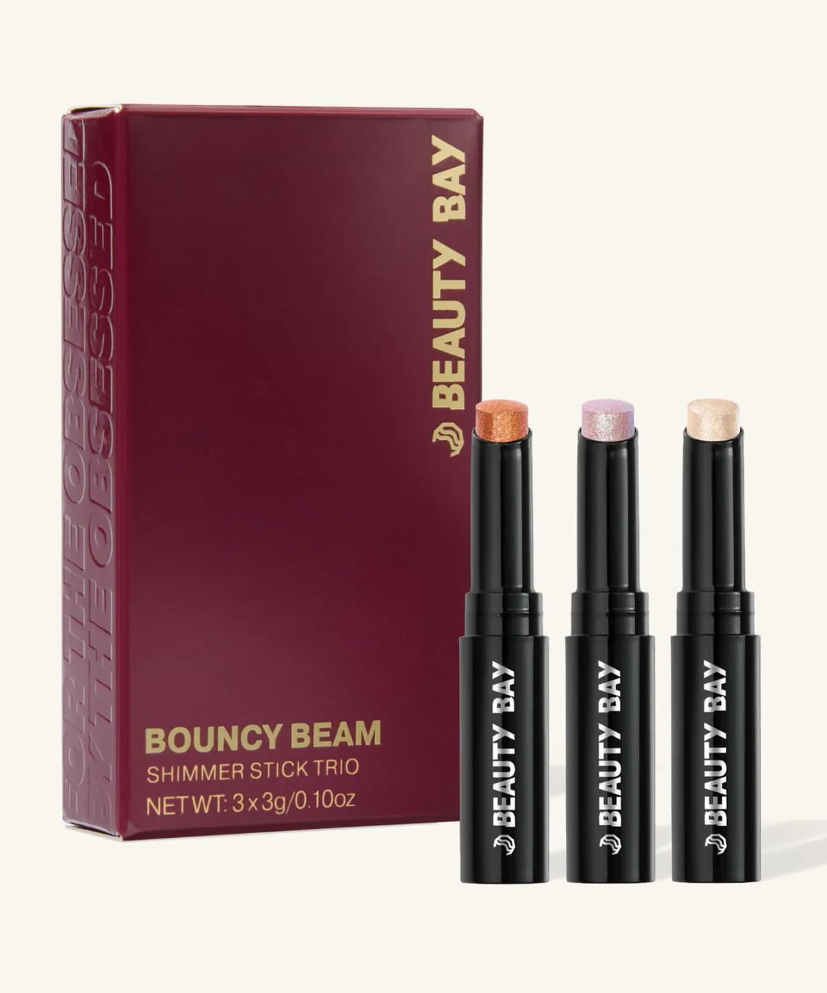 Bouncy Beam Shimmer Stick Trio in burgundy box with copper, iridescent lilac and champagne shimmer sticks