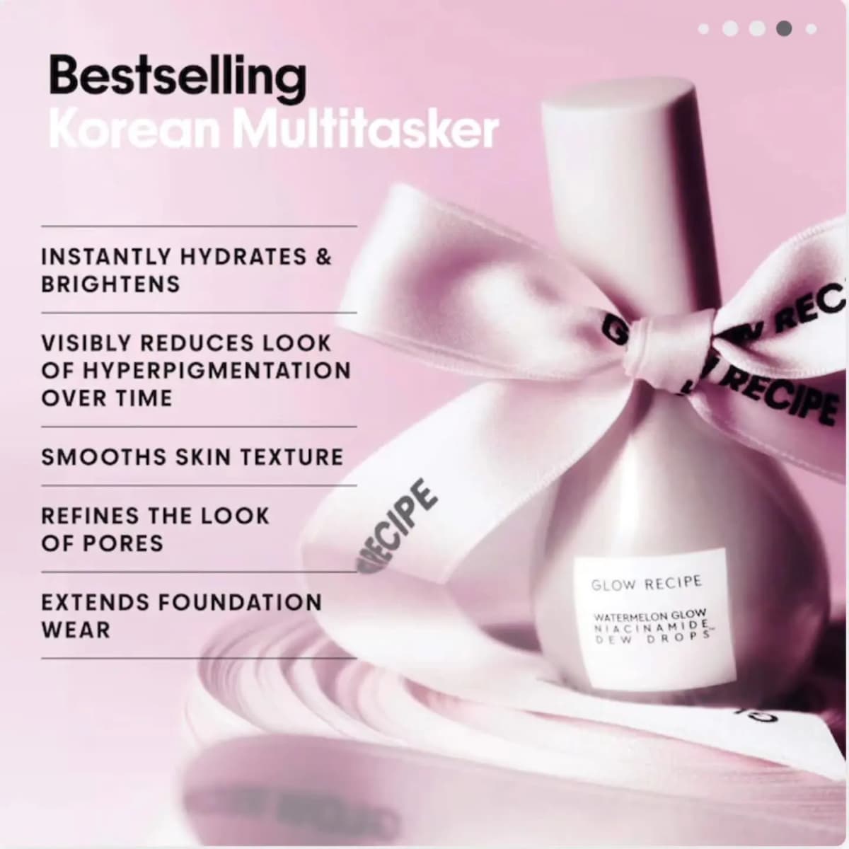 Pearly pink Watermelon Glow Niacinamide Dew Drops bottle tied with a satin Glow Recipe ribbon bow
