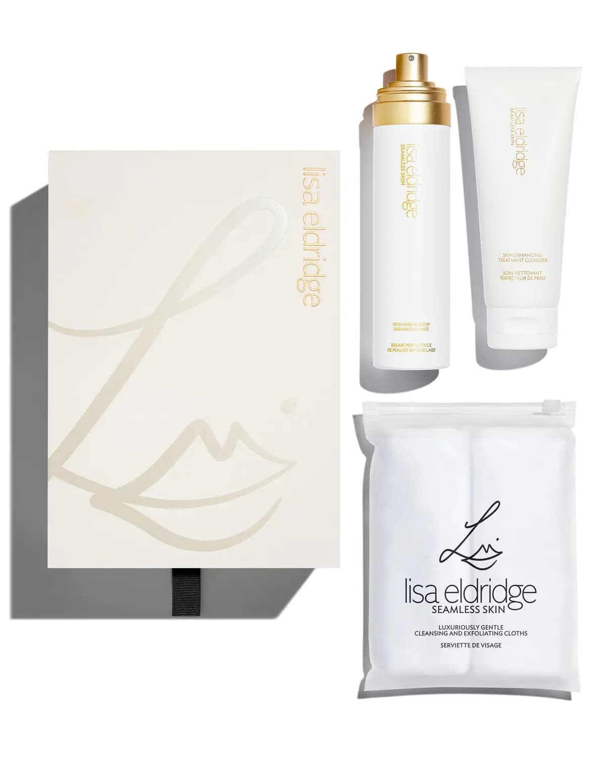 Ivory gift box with a Seamless Skin enhancing mist, treatment cleanser and a pouch of cleansing cloths