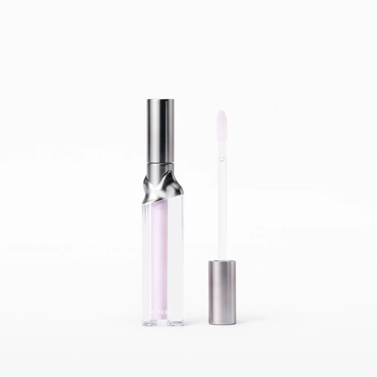 Aurora tube with BYREDO lettering beside its doe-foot applicator tipped with pale lilac gloss