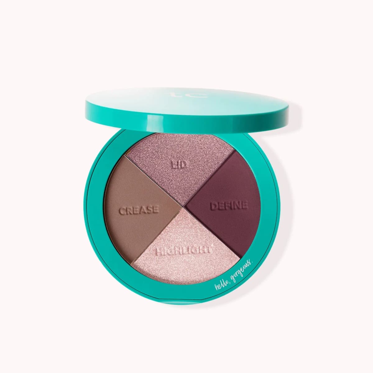Signature Plums quad open on white, with taupe matte crease, deep plum define, mauve shimmer lid and pale pink highlight.