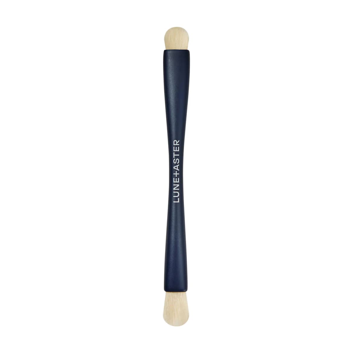 Slim double-ended navy brush with small rounded heads at both ends, sized for eyeshadow