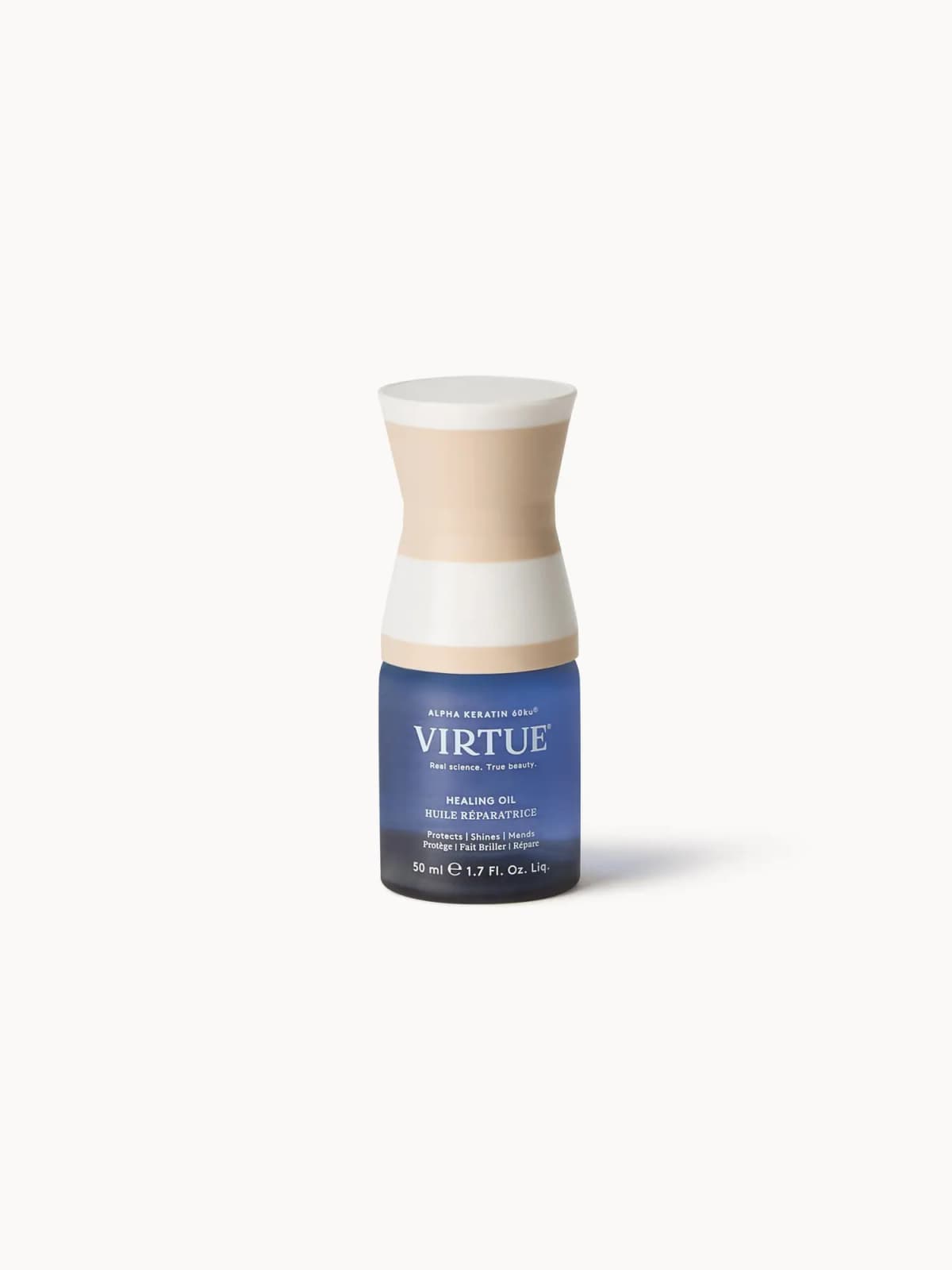 VIRTUE Healing Oil 50 ml in a frosted blue bottle with striped beige and white cap