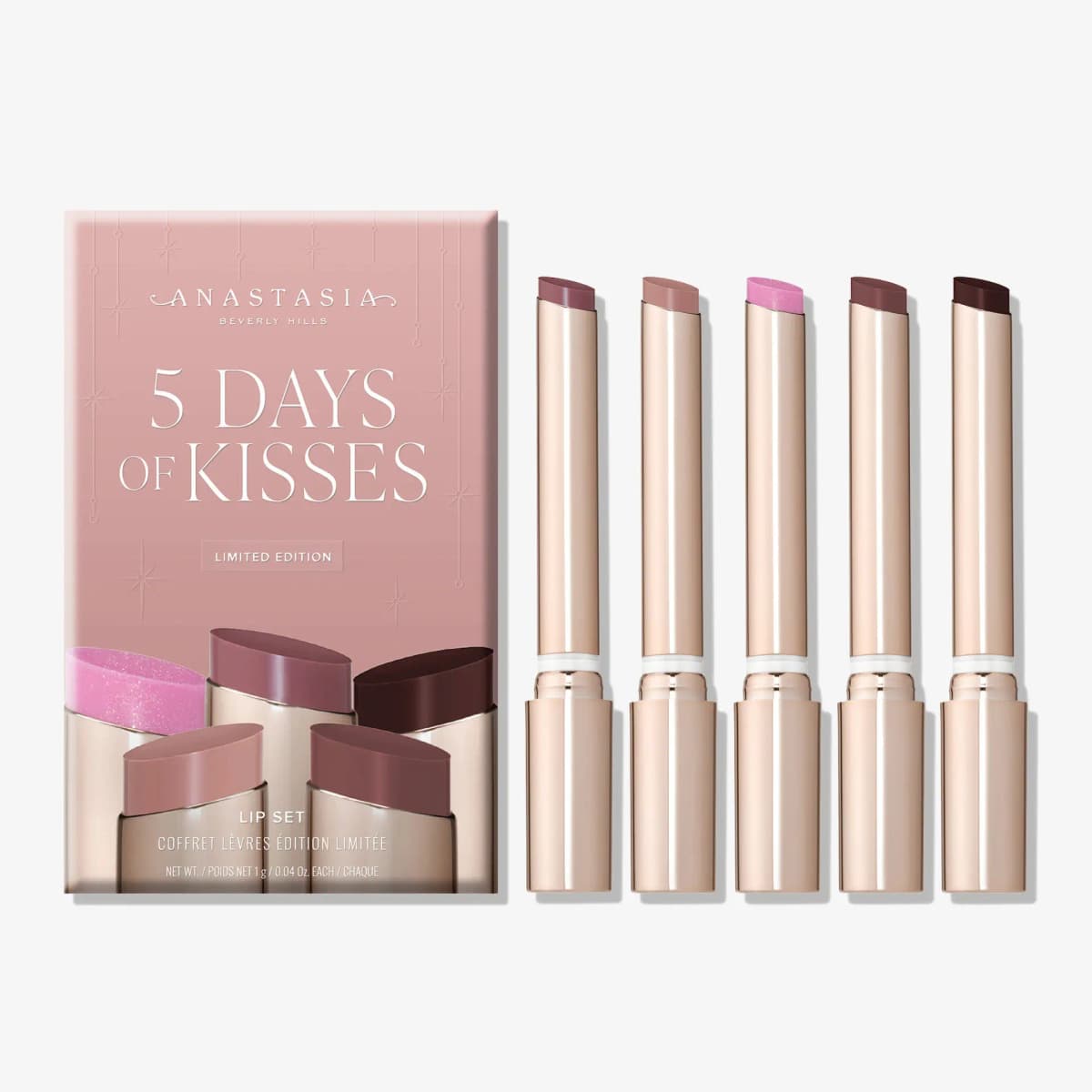 5 Days of Kisses lip set box beside five Kiss Theory bullets from shimmery pink to deep plum-brown
