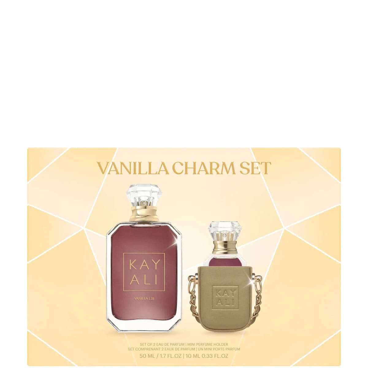 Vanilla Charm Set box front showing the burgundy 50 ml bottle and mini bottle in its gold holder with chain