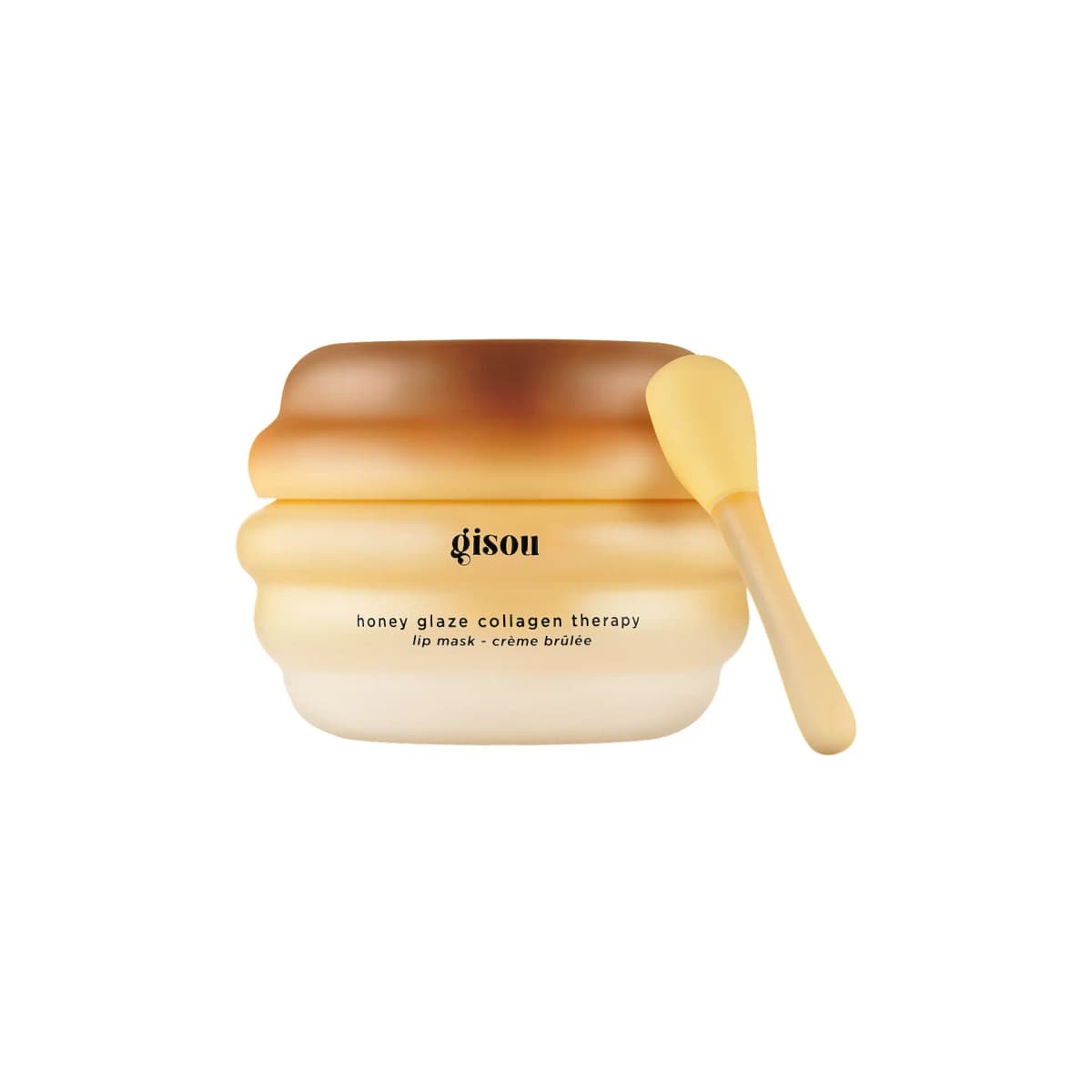 Ribbed lip mask jar with caramel-brown lid fading to cream, yellow spatula leaning on its side