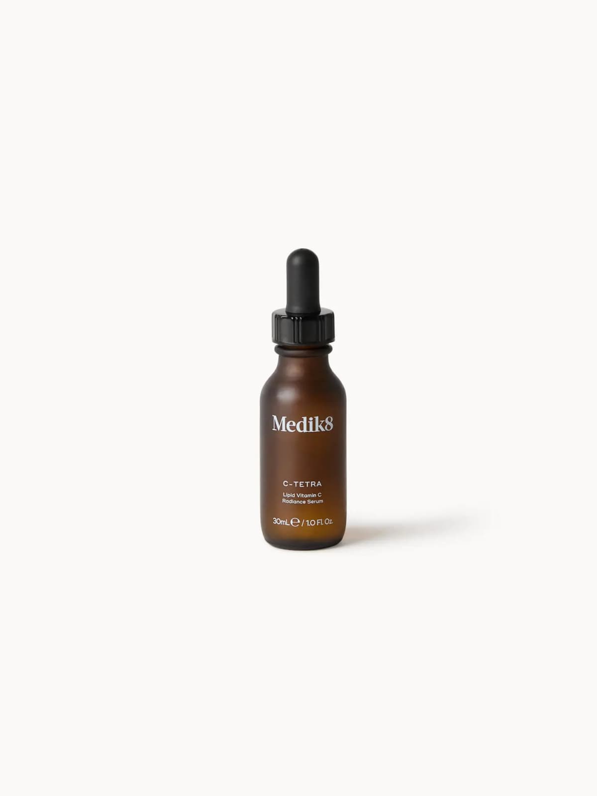 Medik8 C-Tetra Lipid Vitamin C Radiance Serum in an amber dropper bottle, 30 ml