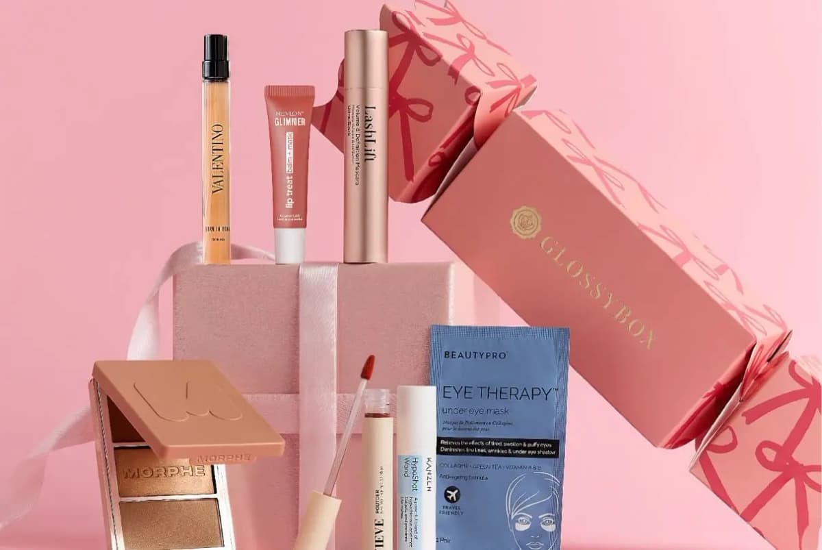 Cracker products incl. Valentino, Revlon Glimmer and Morphe palette by a pink bow-print GLOSSYBOX cracker