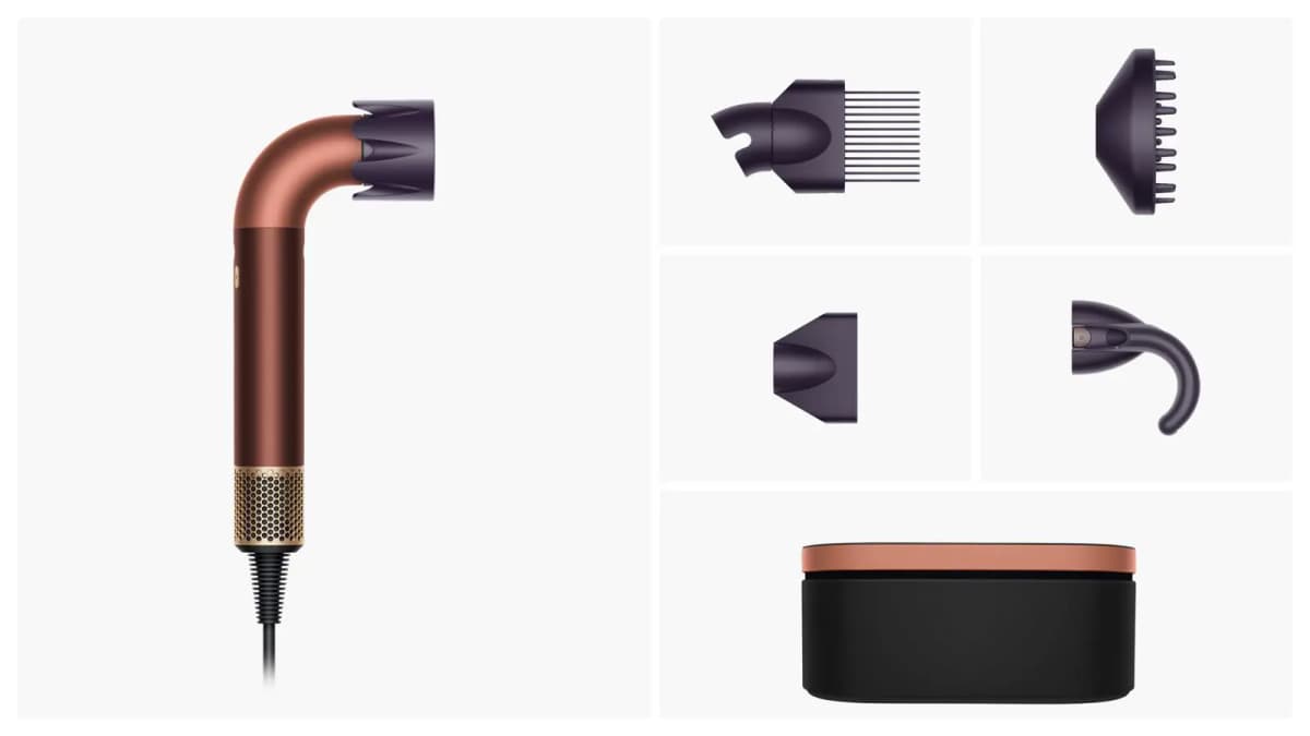 L-shaped copper and brass hair dryer with diffuser, wide-tooth comb, nozzle and hook attachments plus a storage case