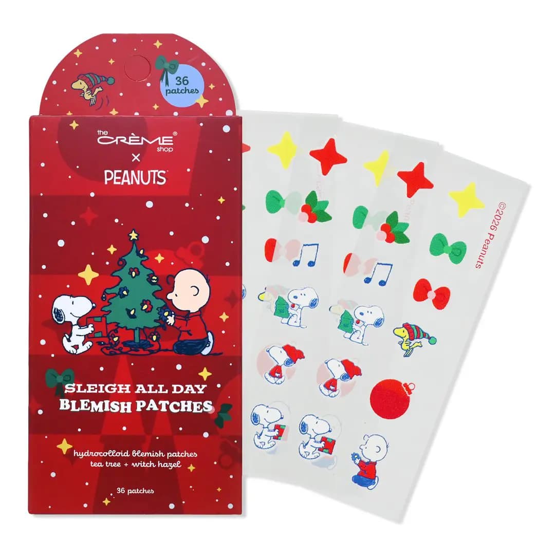 Sleigh All Day Blemish Patches box with Snoopy and Charlie Brown decorating a tree, beside patch sheets.