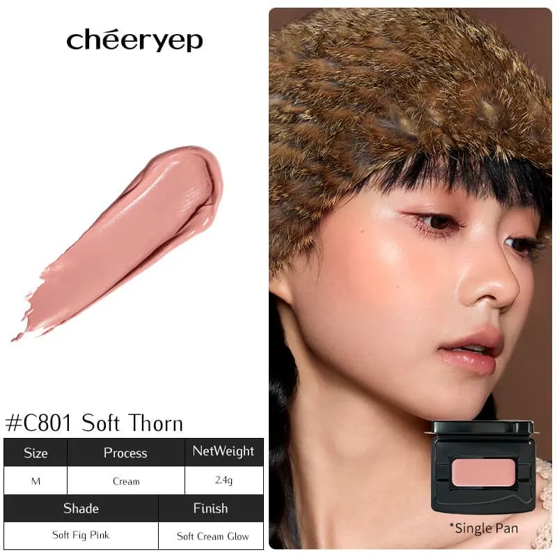 C801 Soft Thorn soft fig pink swatch beside a model in a fur hat wearing glowy peachy blush, with a single pan