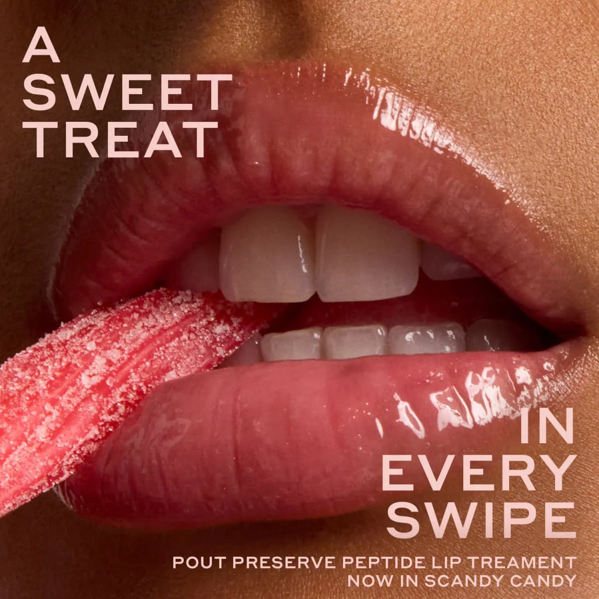 Close-up of glossy pink lips biting a sugar-coated pink candy strip with 'A sweet treat in every swipe' text