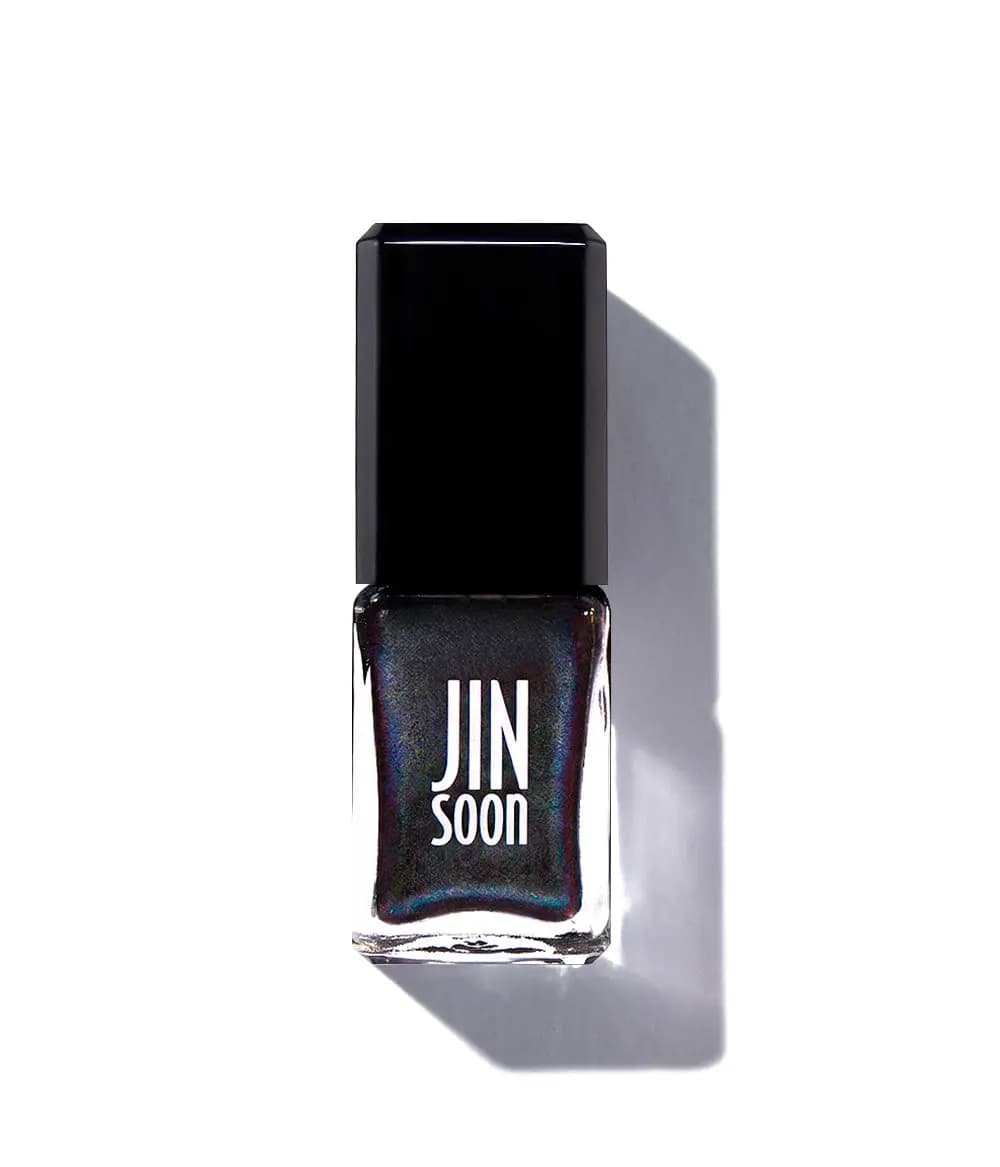 JINsoon nail polish bottle in a dark shade with a subtle multicoloured pearl sheen on a white background