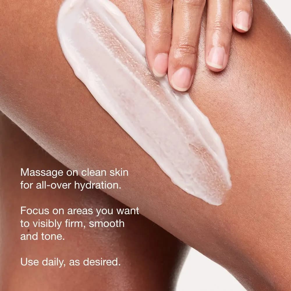 Hand massaging a thick white swipe of lotion onto a leg, with how-to-use instructions in white text