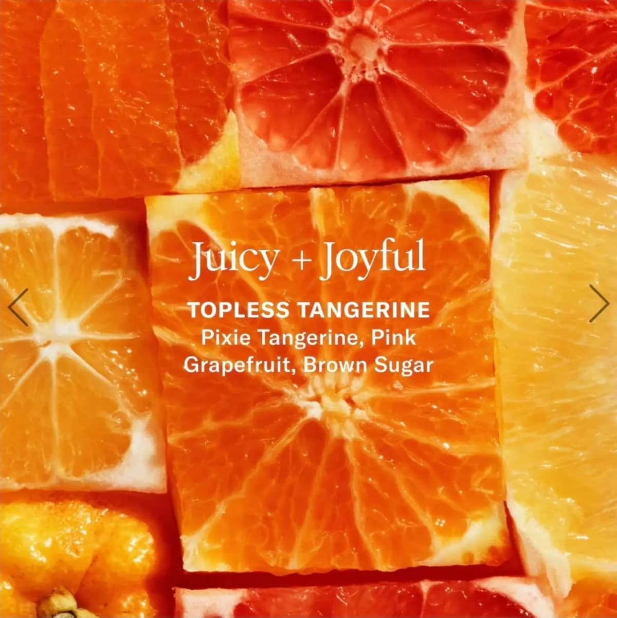 Sliced tangerines and pink grapefruit behind text for the Topless Tangerine scent, labelled Juicy + Joyful