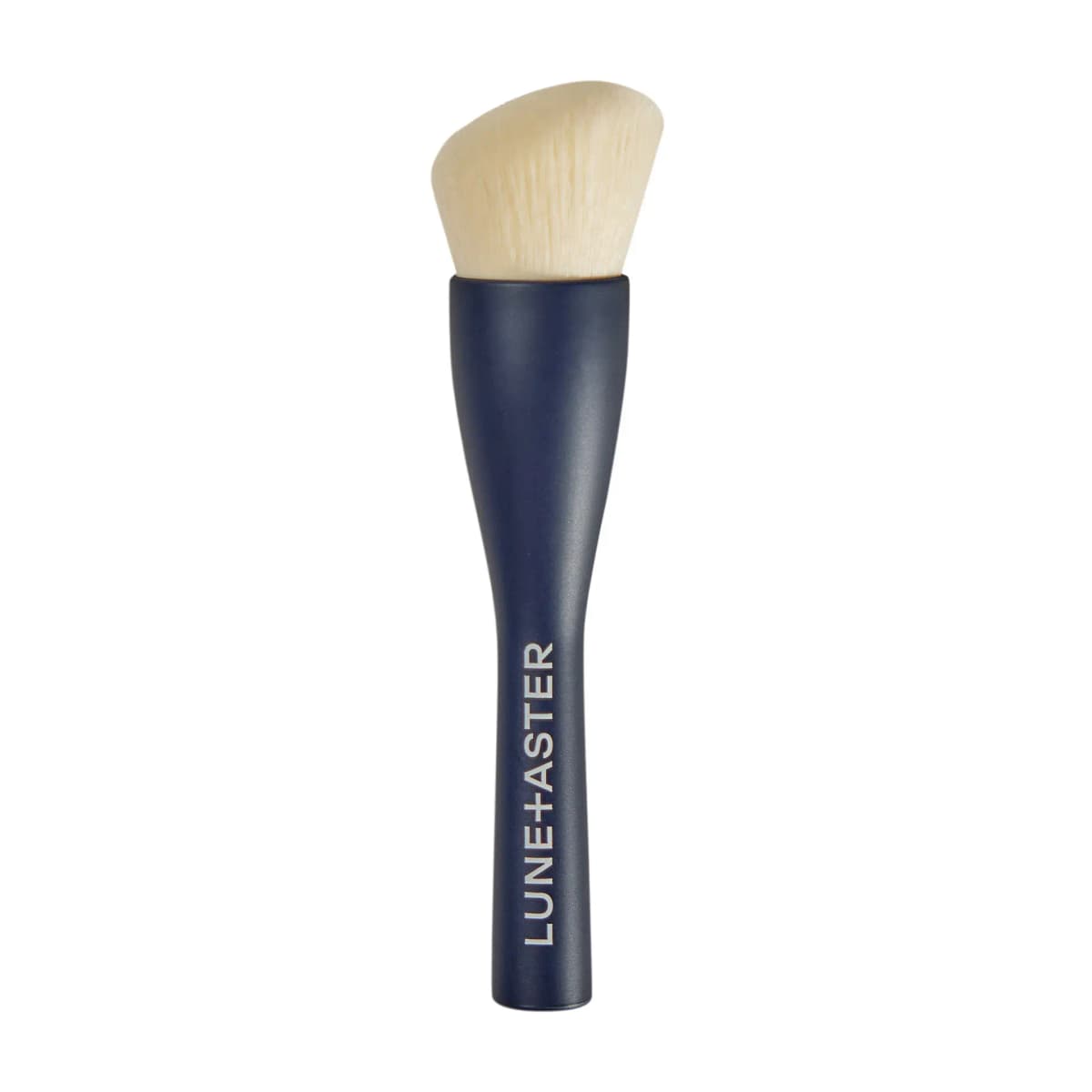 Navy-handled brush with a dense, angled cream-coloured synthetic head and Lune+Aster logo