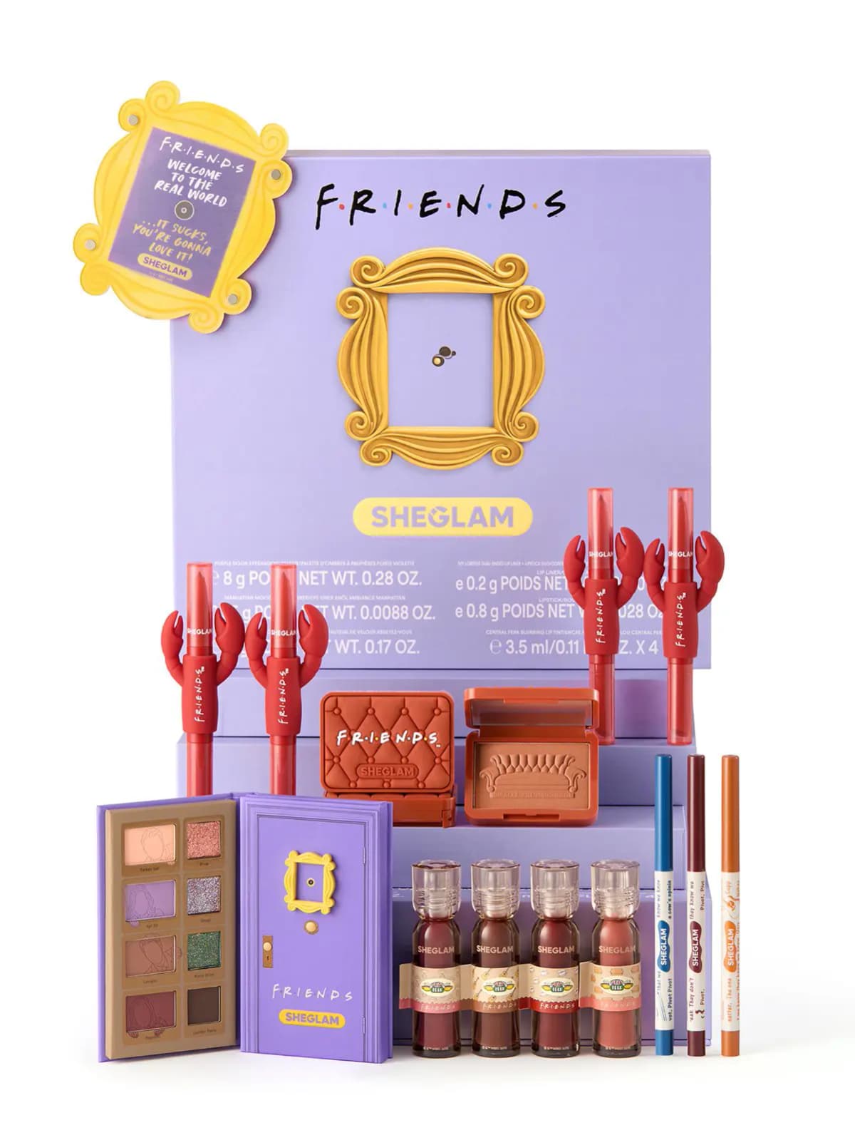 FRIENDS x SHEGLAM collection with purple door palette, sofa blush, lobster lip duos, lip tints and eyeliners on a purple box