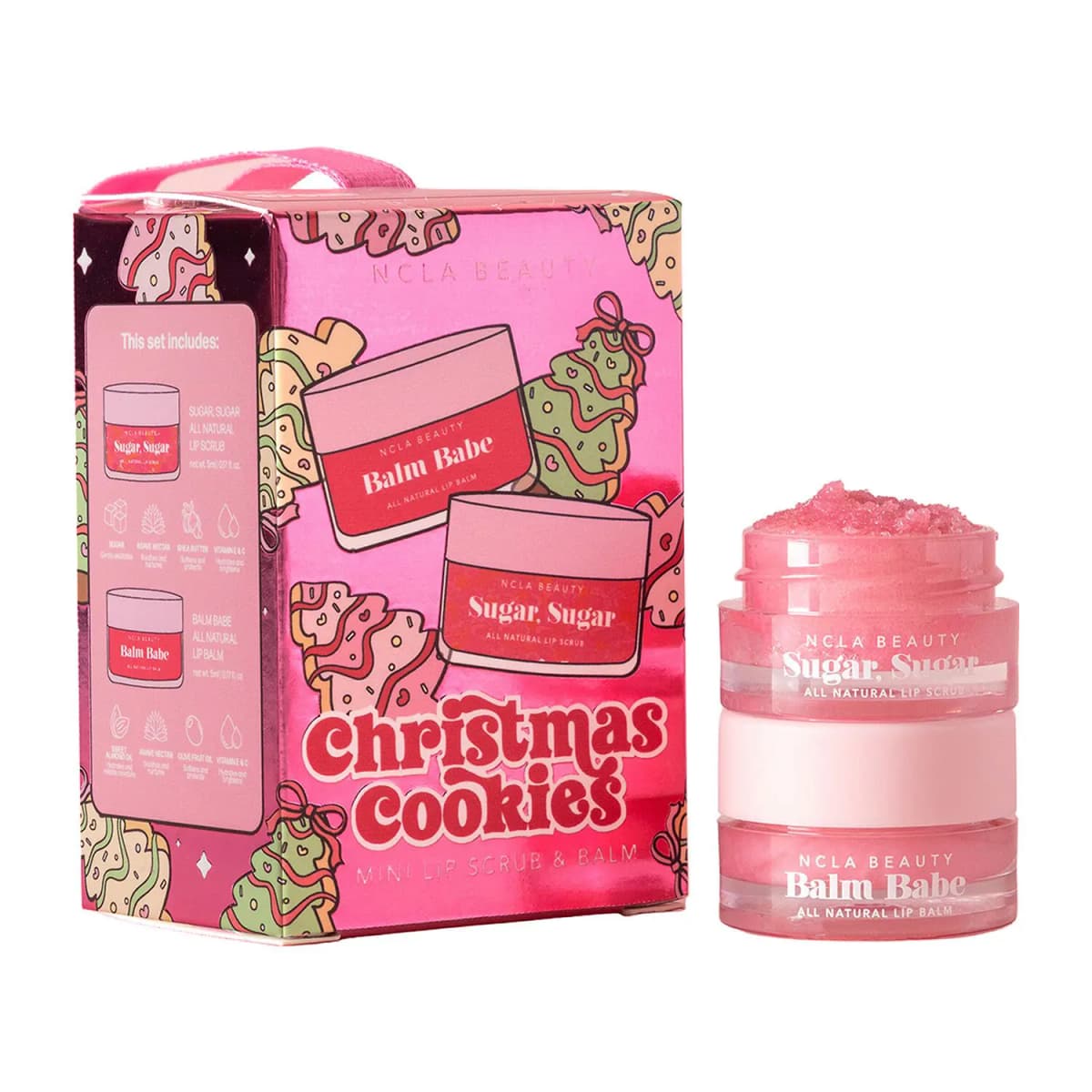 Pink foil Christmas Cookies box with tree cookie art beside stacked pink Sugar, Sugar scrub and Balm Babe jars