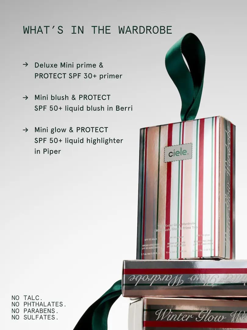 Striped Winter Glow Wardrobe boxes stacked beside a list of the three minis and no talc, phthalates, parabens, sulfates