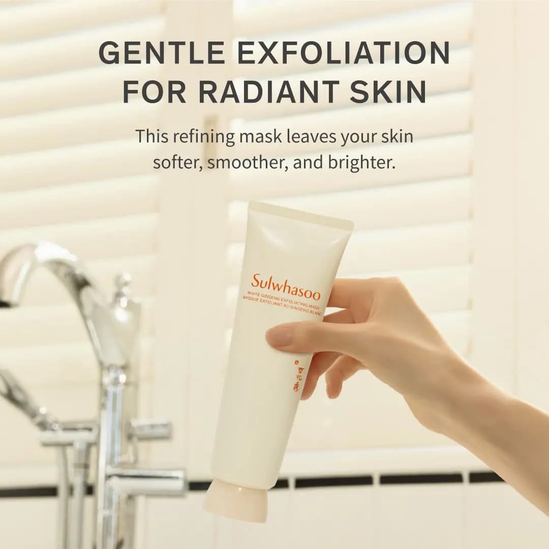 Hand holding the cream tube near a chrome bath faucet and white shutters, headline on gentle exfoliation