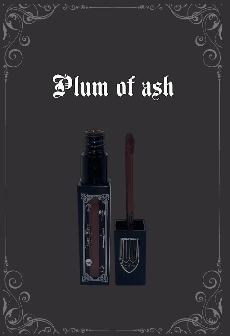 Plum of ash tube open beside its applicator on a charcoal gray background with silver scroll corners.