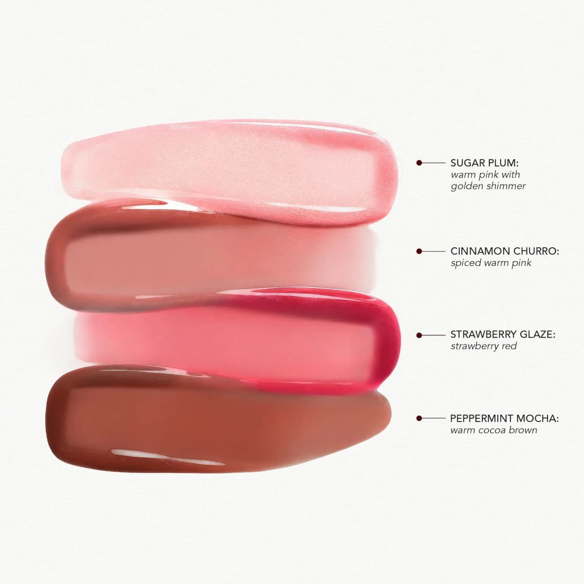 Overlapping glossy smears labelled Sugar Plum, Cinnamon Churro, Strawberry Glaze and Peppermint Mocha with shade notes