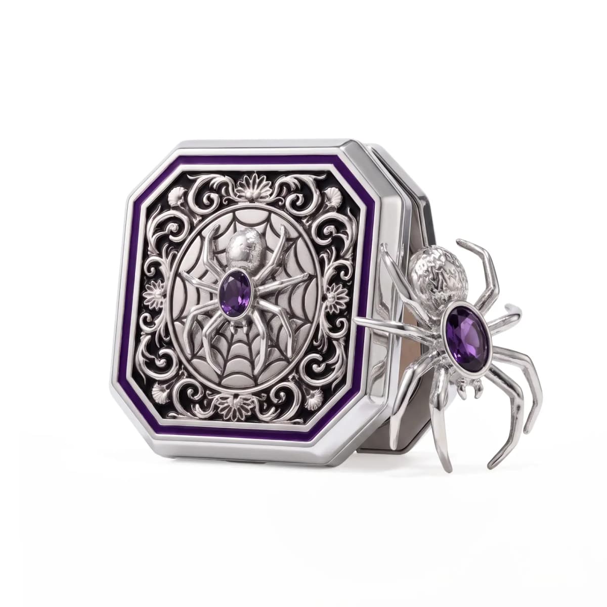 Bésame Signature Spider Compact with silver spider-web lid, purple stone and purple enamel trim beside the Spider Pin