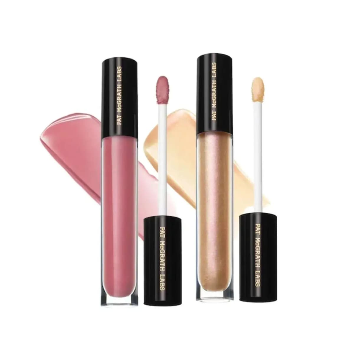 Pink and pearly champagne glosses with open applicators in front of glossy pink and pale gold swatches