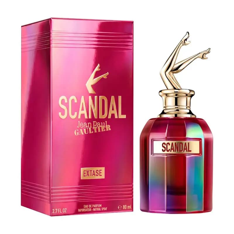 Pink metallic Extase box beside the red iridescent women's bottle with gold legs cap, labelled 80 ml