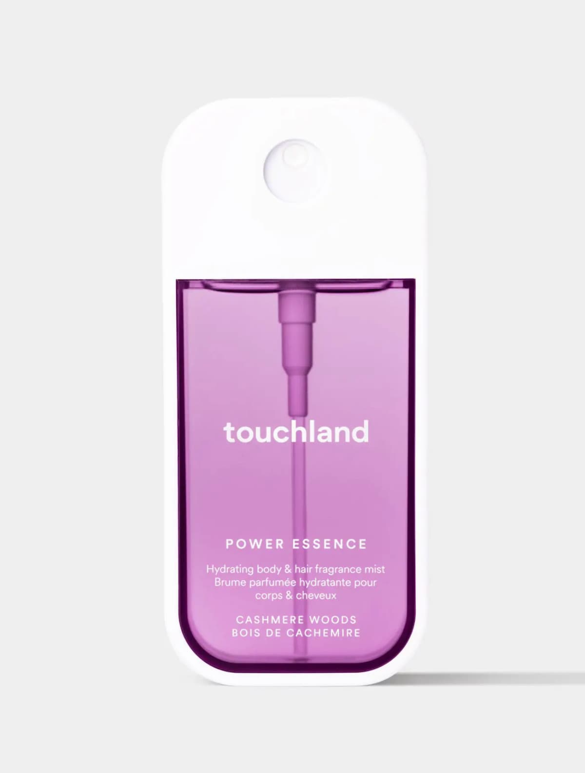 Purple Touchland Power Essence hydrating body and hair fragrance mist in Cashmere Woods scent.