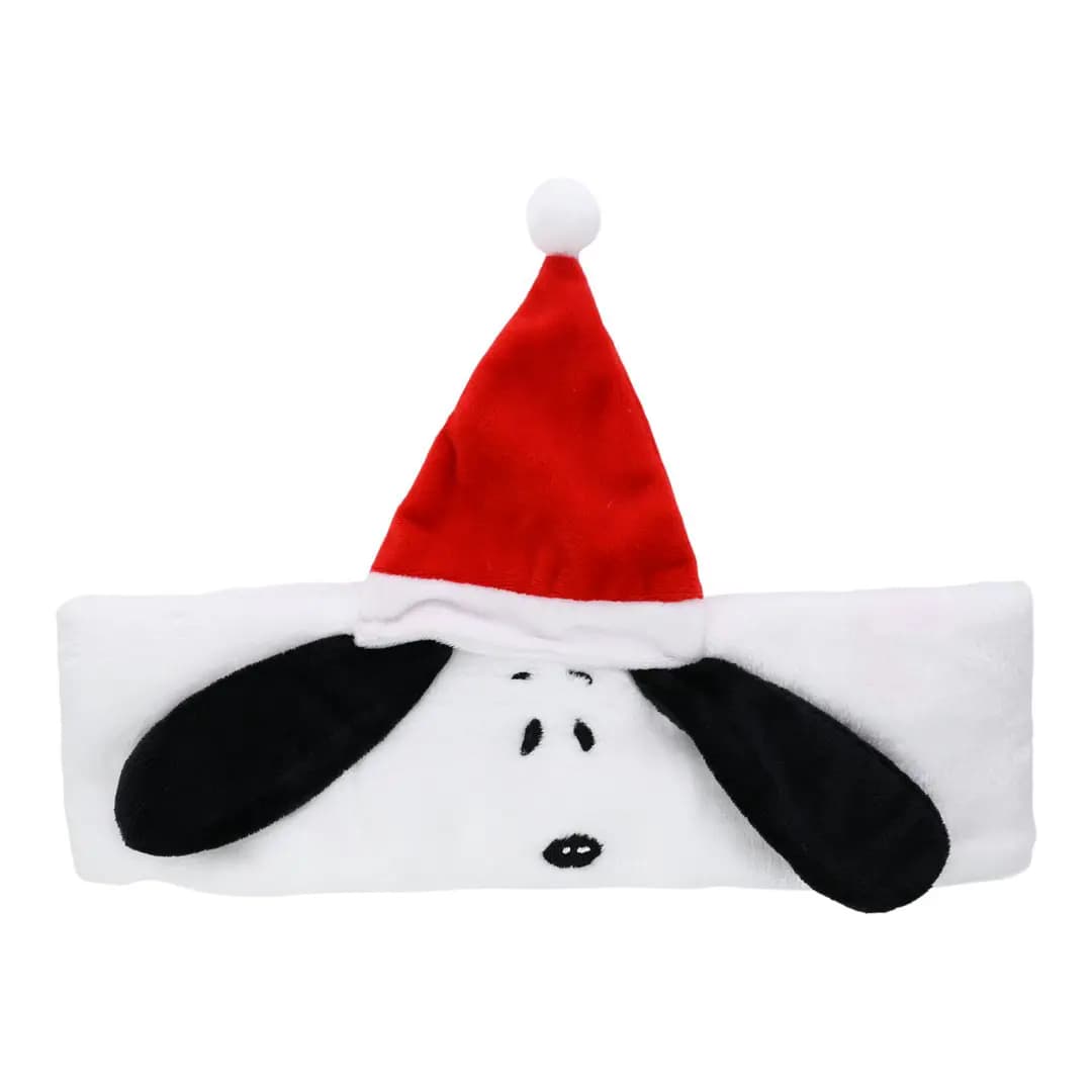 White plush Snoopy headband with black floppy ears, embroidered face and red Santa hat with pom-pom.