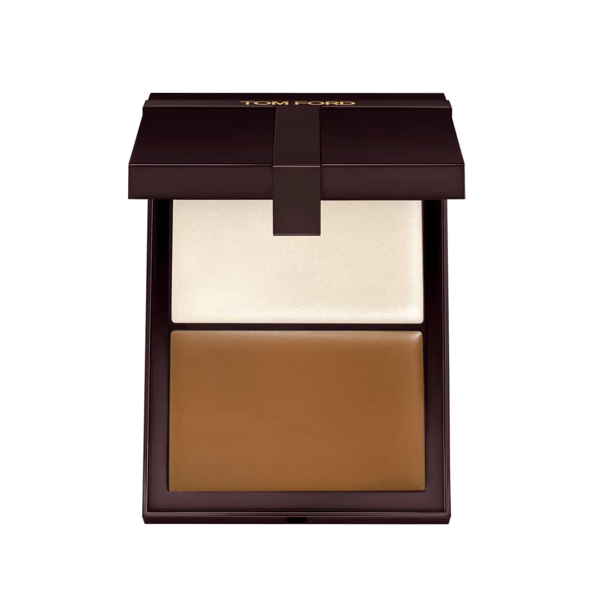 Open Tom Ford contour duo pairing a shimmering ivory-champagne highlighter with a golden caramel-brown contour