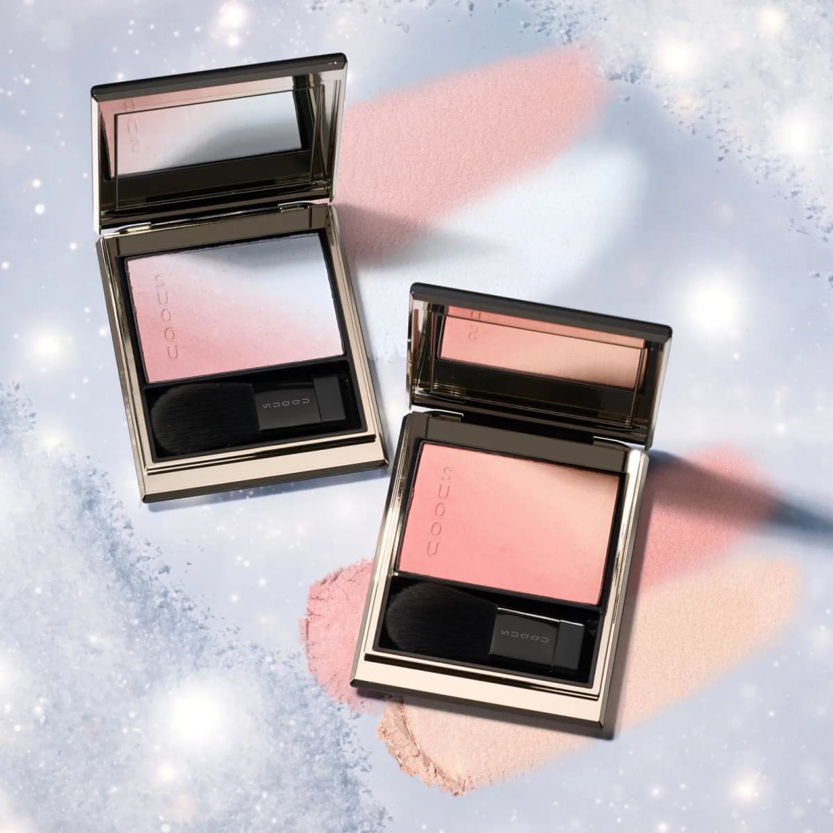 Both gradient blushes open on a frosty background with pink and peach powder smudges