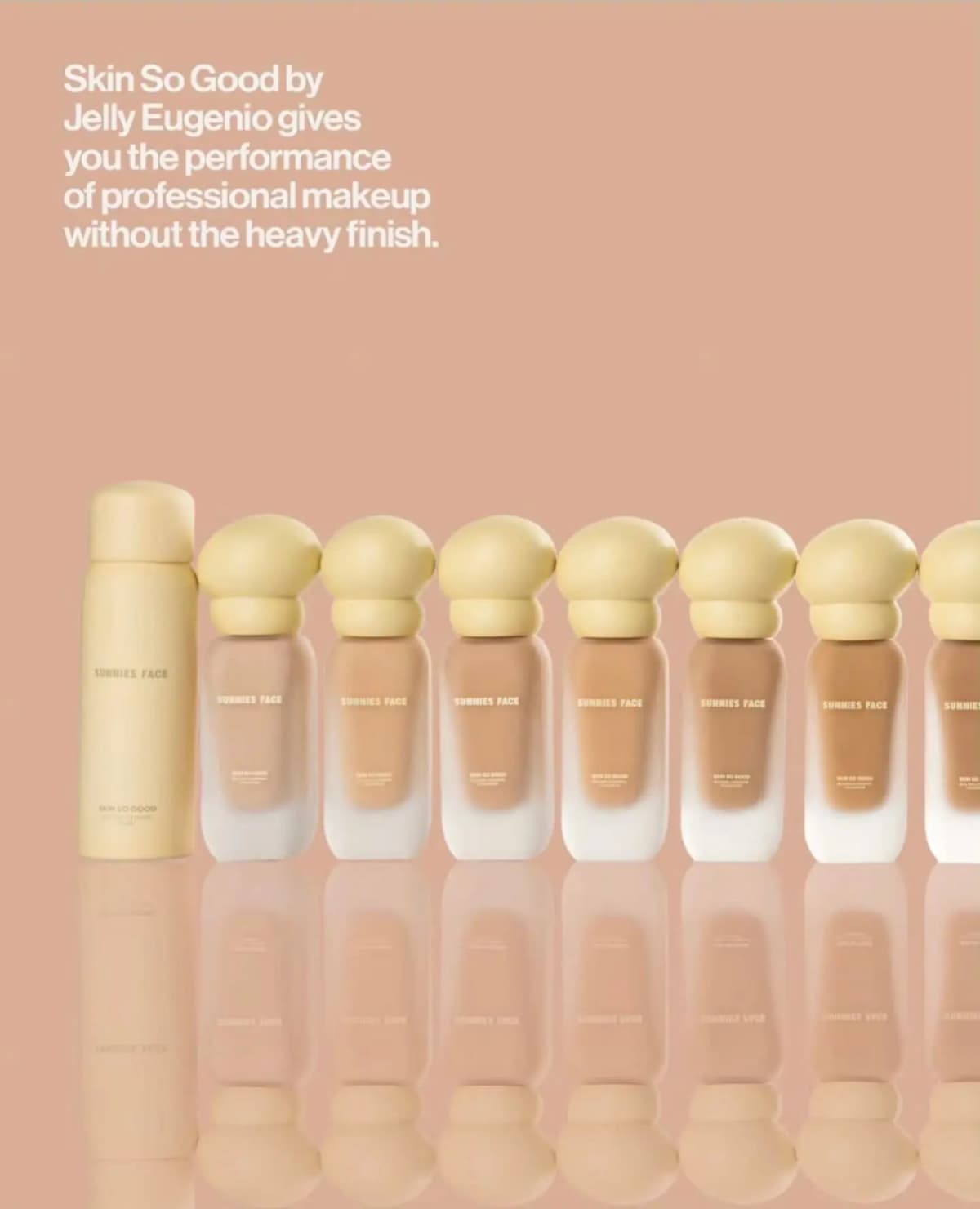Sunnies Face Skin So Good fixing spray and a row of RealSkin foundation bottles in pale yellow caps, left half of the lineup