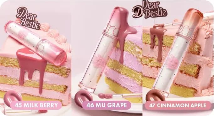 Juicy Lasting Tints 45 Milk Berry, 46 Mu Grape and 47 Cinnamon Apple dripping glossy colour over pink layer cake slices