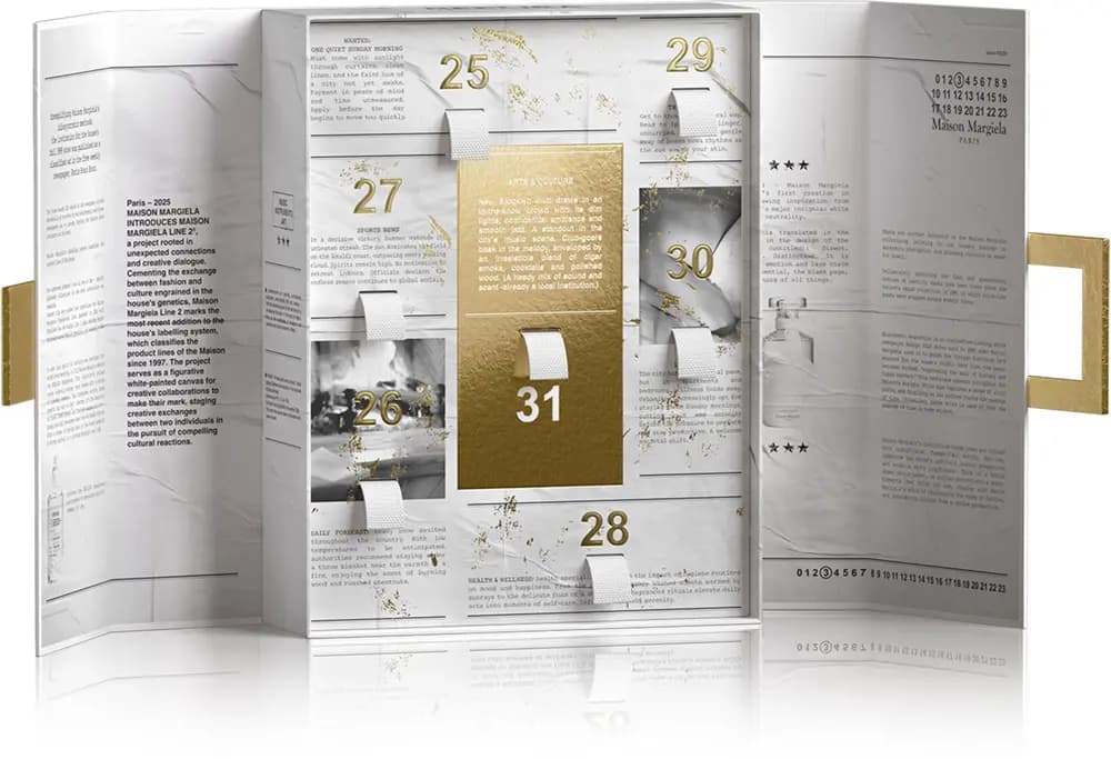 Opened calendar with doors numbered 25 to 31, a gold central door 31 and gold handles on fold-out newspaper panels