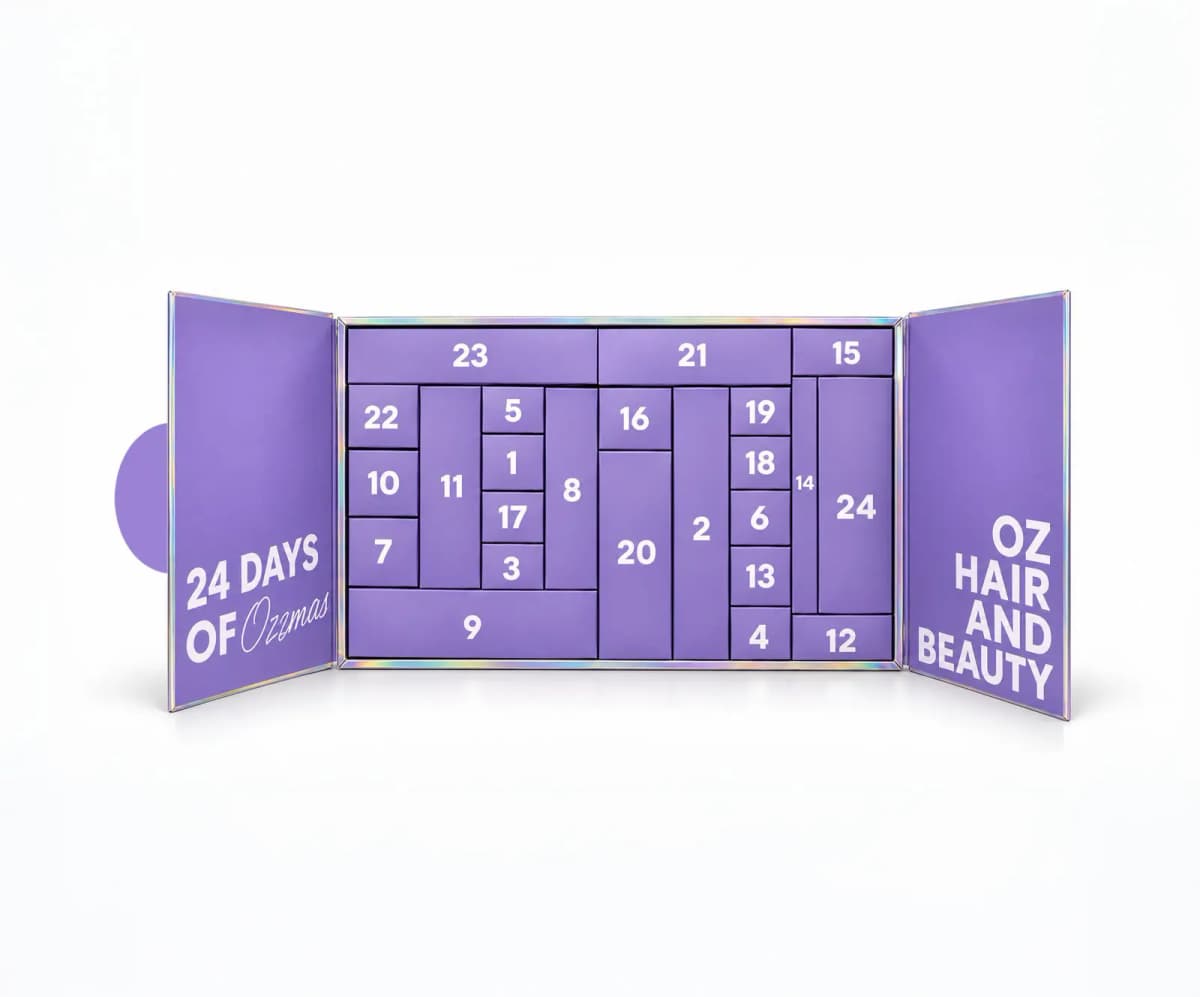 Calendar opened to show purple numbered doors 1 to 24, inner flaps reading 24 Days of Ozzmas and Oz Hair and Beauty