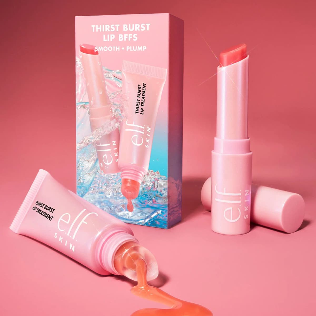 E.l.f. SKIN Thirst Burst Lip BFFs box with an uncapped coral lip stick and a tube oozing peach gel on a rose-pink backdrop.