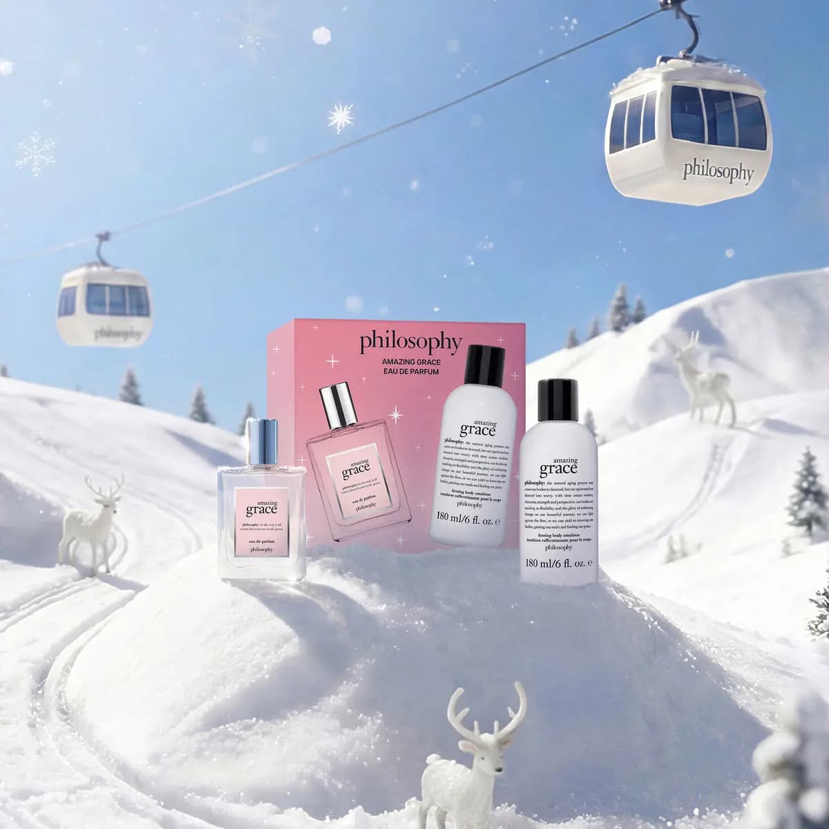 Philosophy amazing grace eau de parfum set with perfume and firming body emulsion on snow under white cable cars