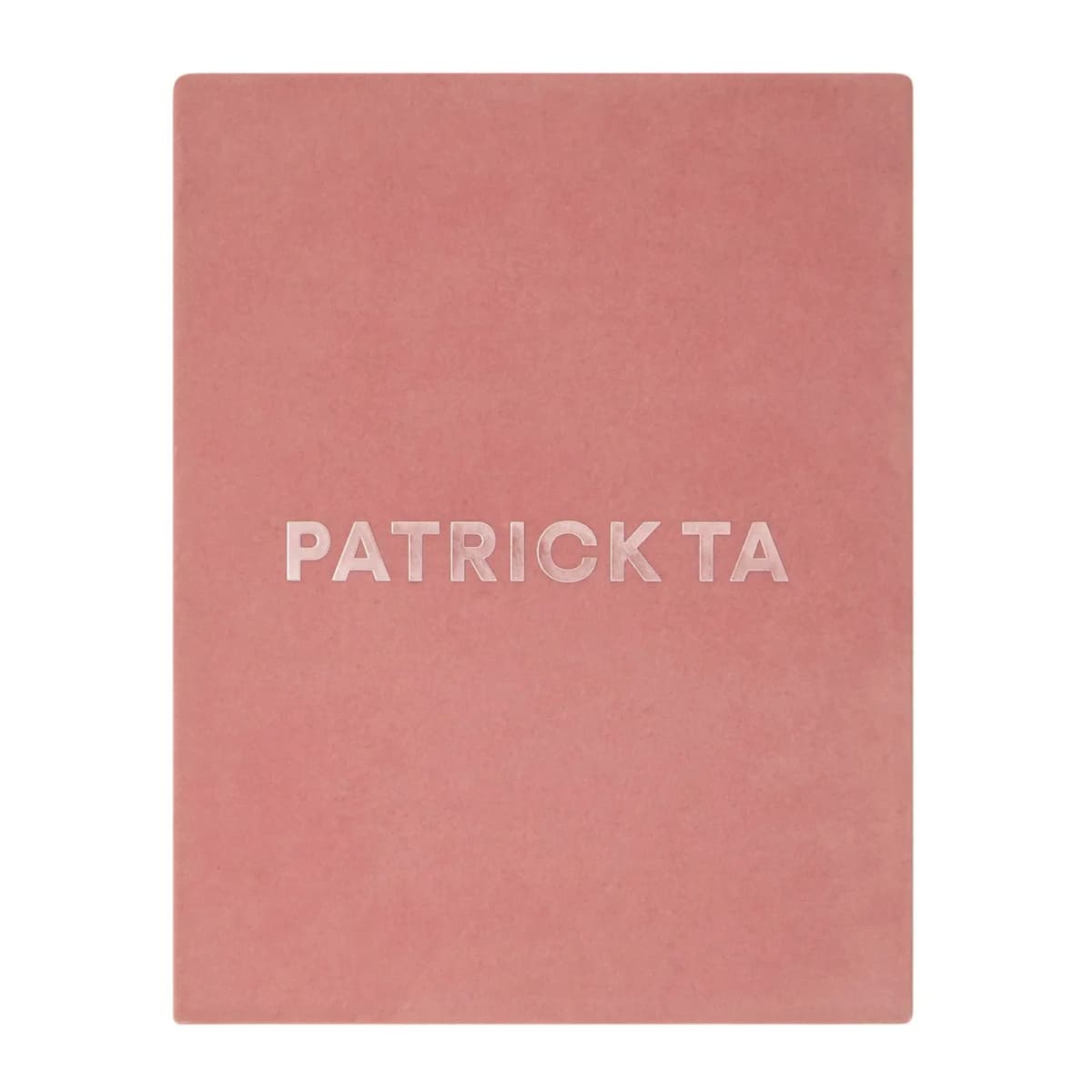 Closed dusty pink velvet vault lid with shiny embossed Patrick Ta lettering