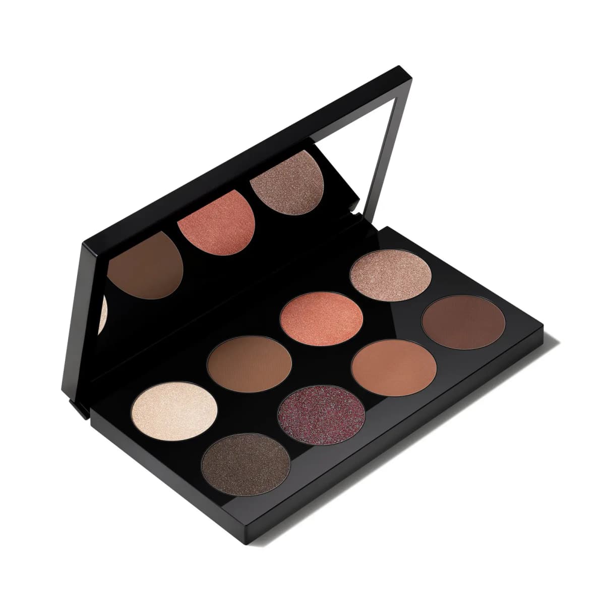 Open eight-pan palette of champagne, copper, matte browns, charcoal shimmer and plum glitter shadows with mirrored lid.