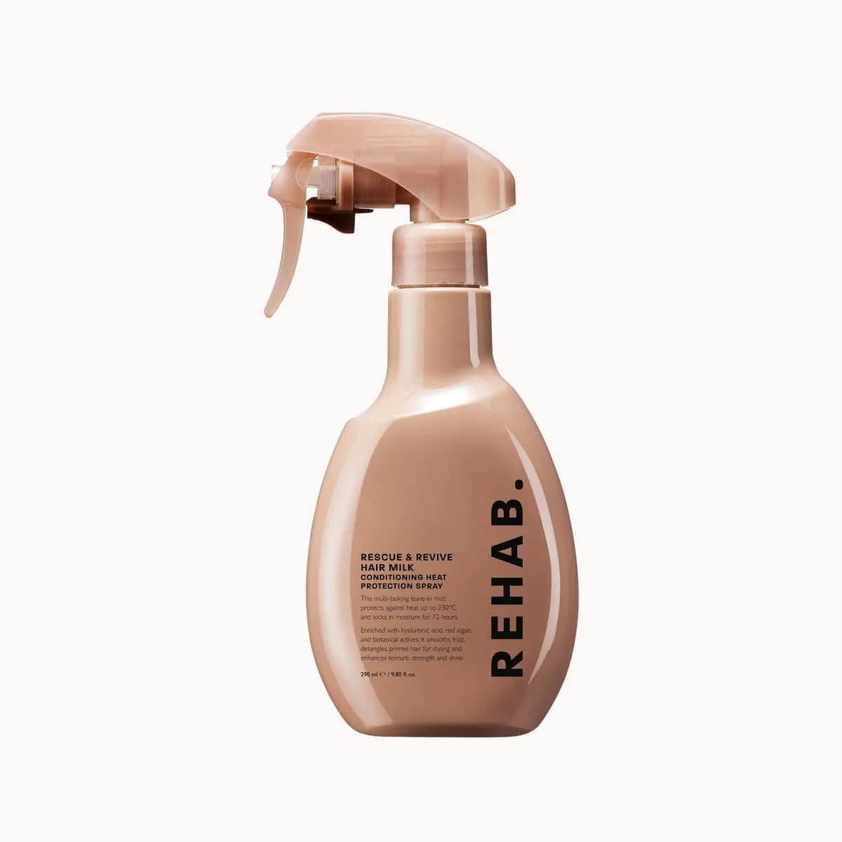 Hair Milk conditioning heat protection spray in a glossy nude bottle with matching trigger sprayer