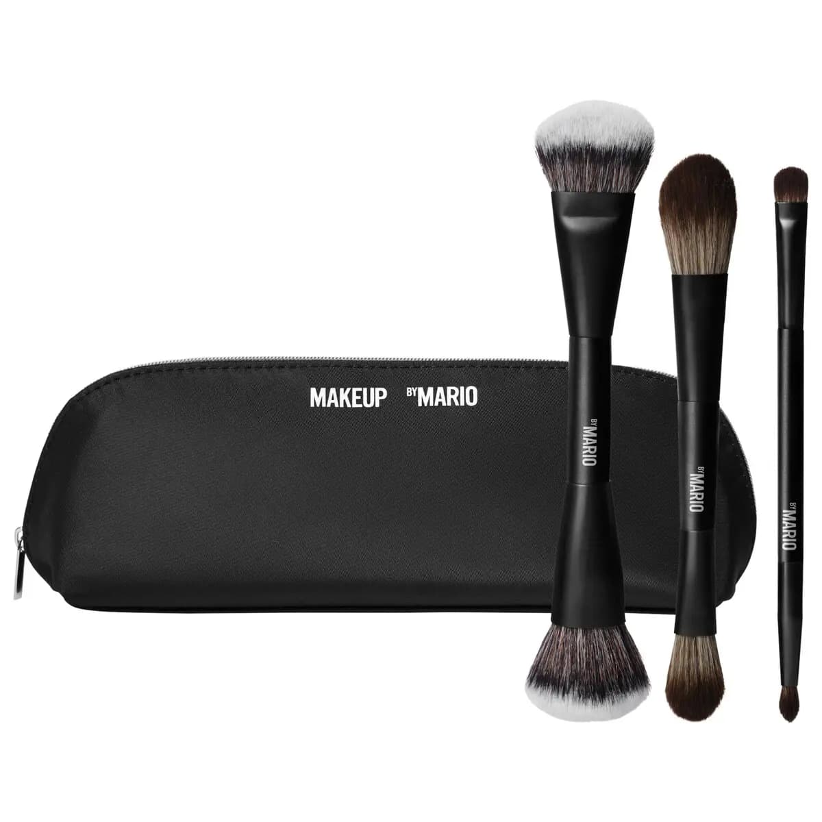 Makeup By Mario brush trio featuring three black face and eye brushes displayed with a zippered black pouch.