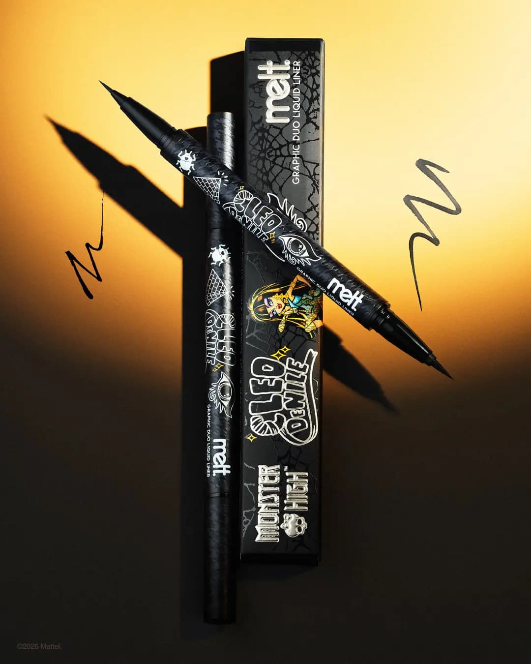 Melt Cosmetics x Monster High Graphic Duo Liquid Liner in Black Onyx, two pens on Cleo De Nile box with black swatches